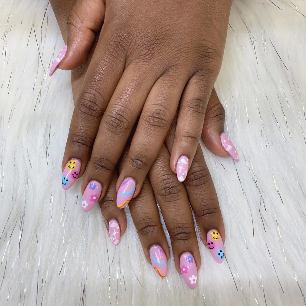 Stylish Almond Nails With Smiley Designs