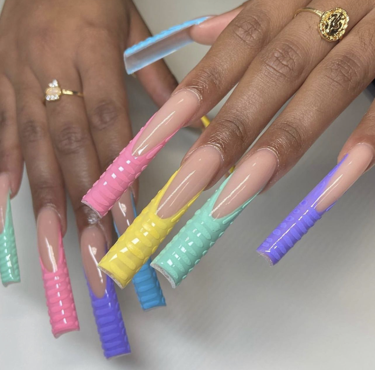 Nude Acrylic Nails With Multi-colored Croc Tips