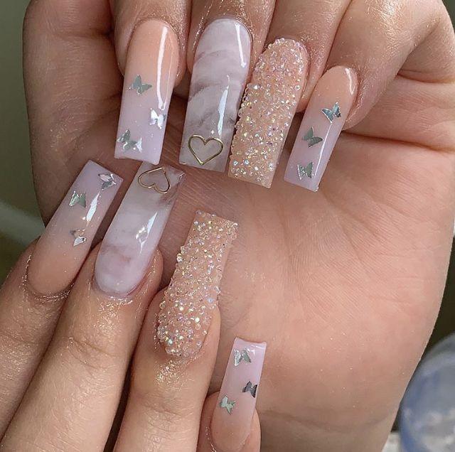 White and nude medium coffin nails with butterfly stickers
