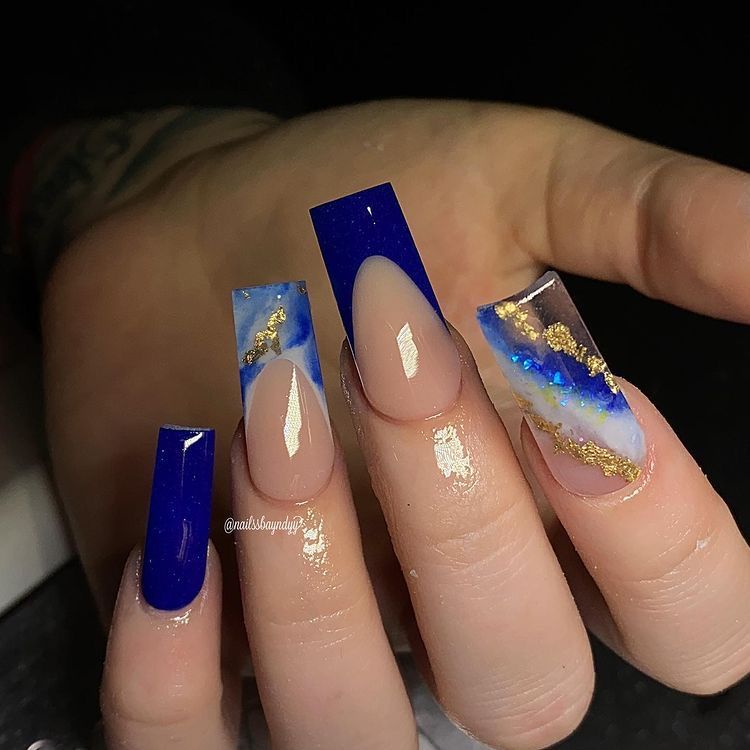 Deep Blue and nude short coffin nails with gold stripes