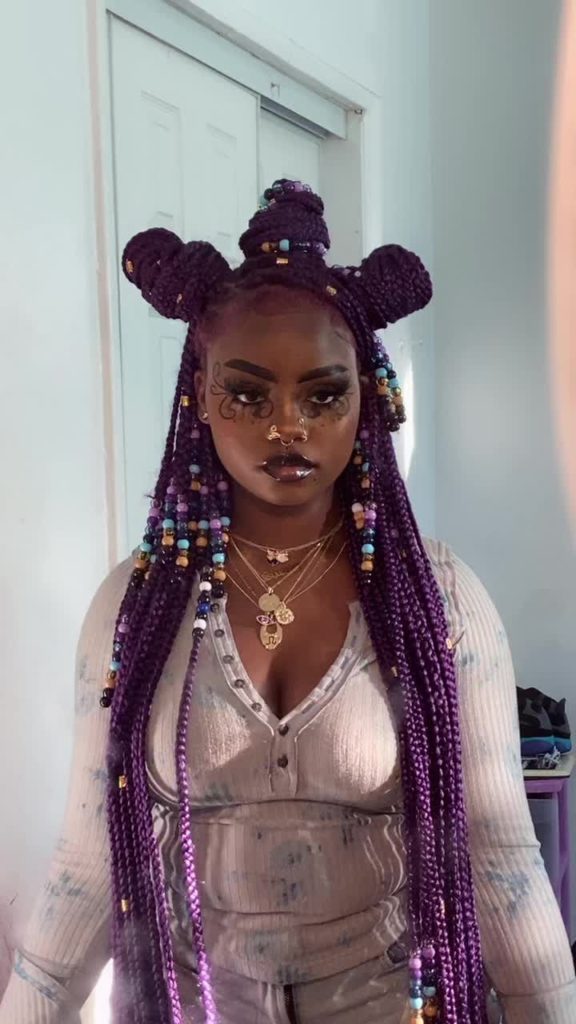 bantu styled purple box braids with beads