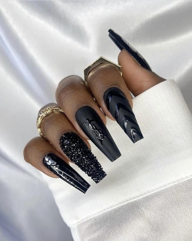 Black matte YSL themed coffin nails.