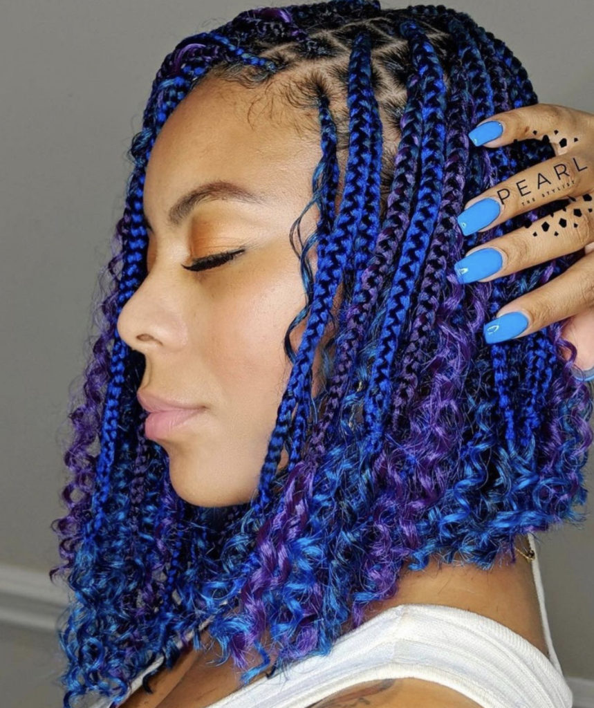 short purple and blue box braids with curls