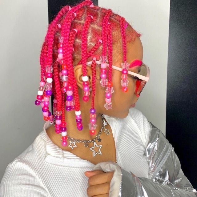 short pink box braids with beads