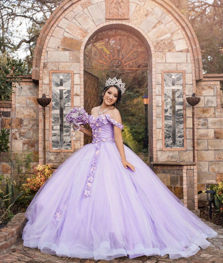 Purple flowery Quinceanera Ball Gown.