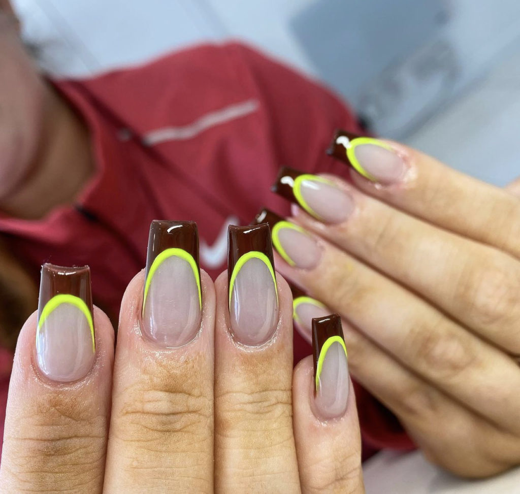 8. Short brown and neon coffin nails.