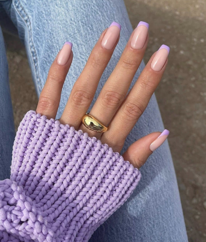 7. Natural nude coffin nails with purple tips.