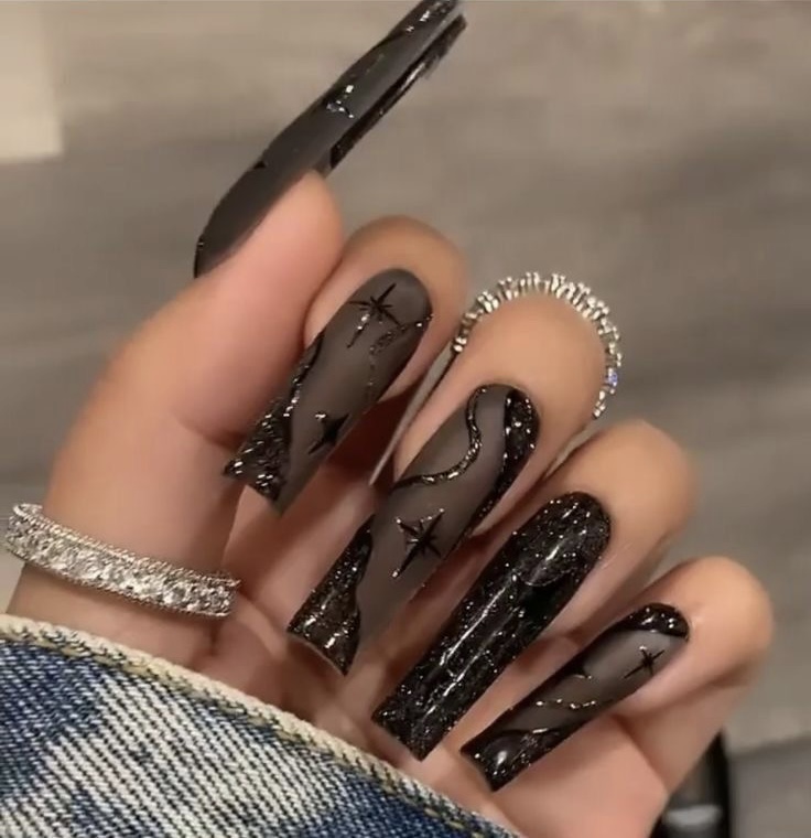 black starry themed coffin nails