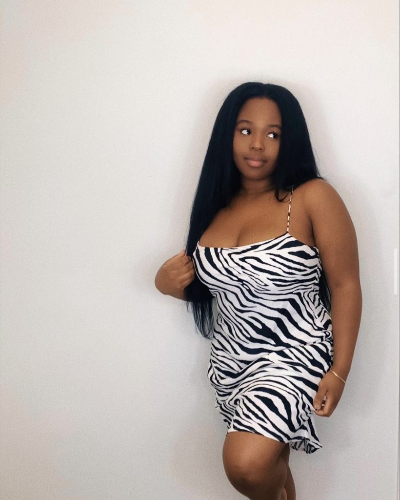 Black and white strapped mini zebra print dress