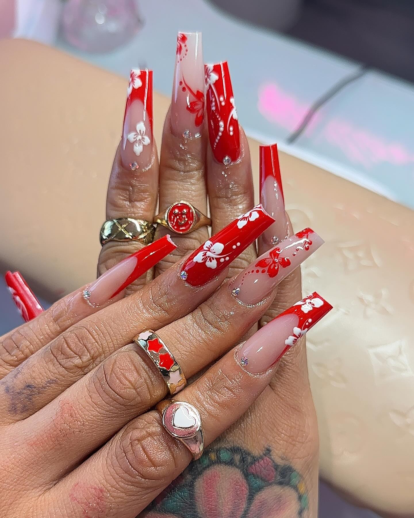 Red Acrylic Nails With With And Red hand Drawn Petals 
