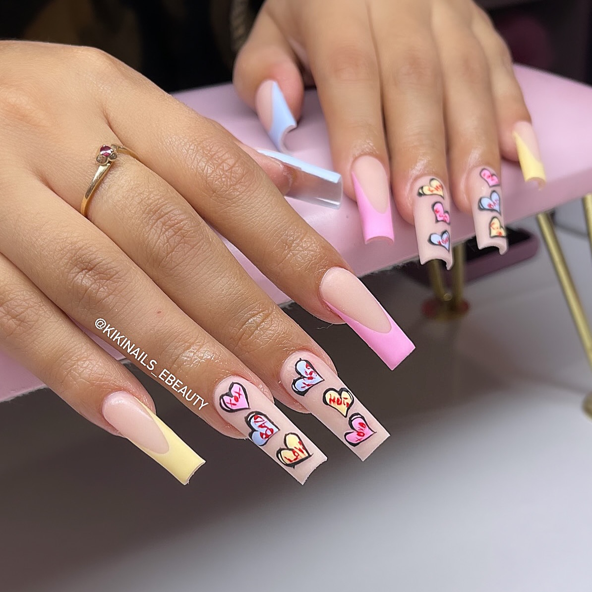 Nude Acrylic Nails With Pastel Hearts