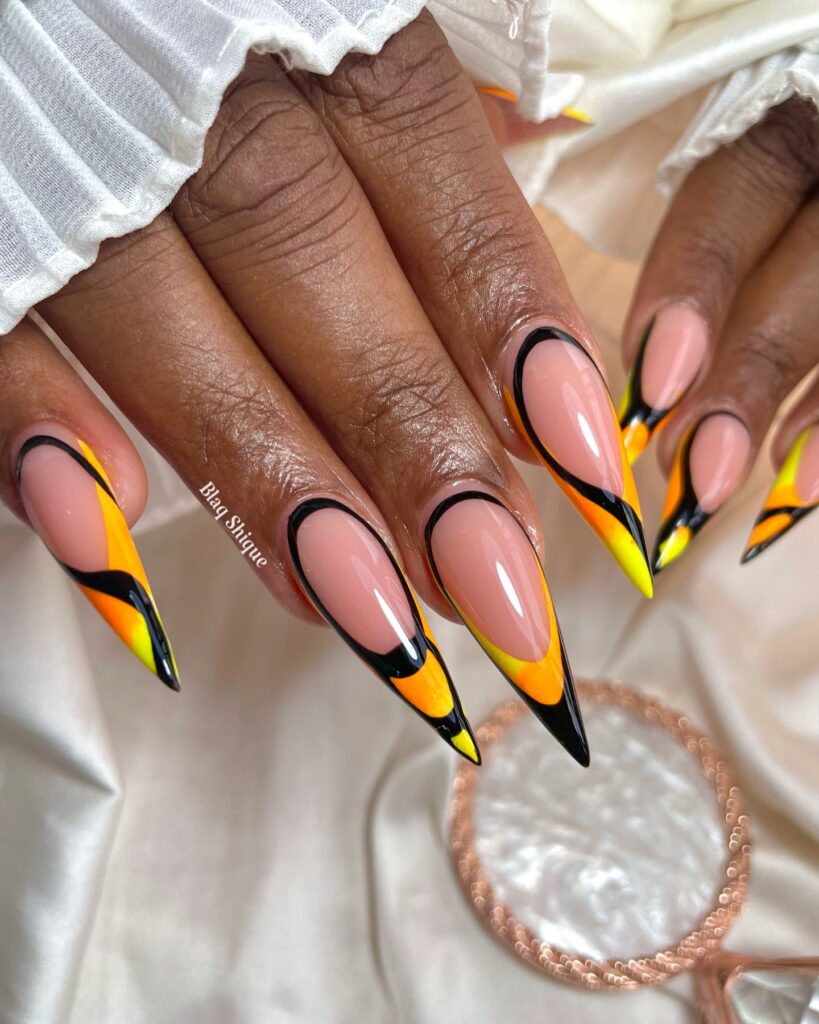Orange Stilleto Nails