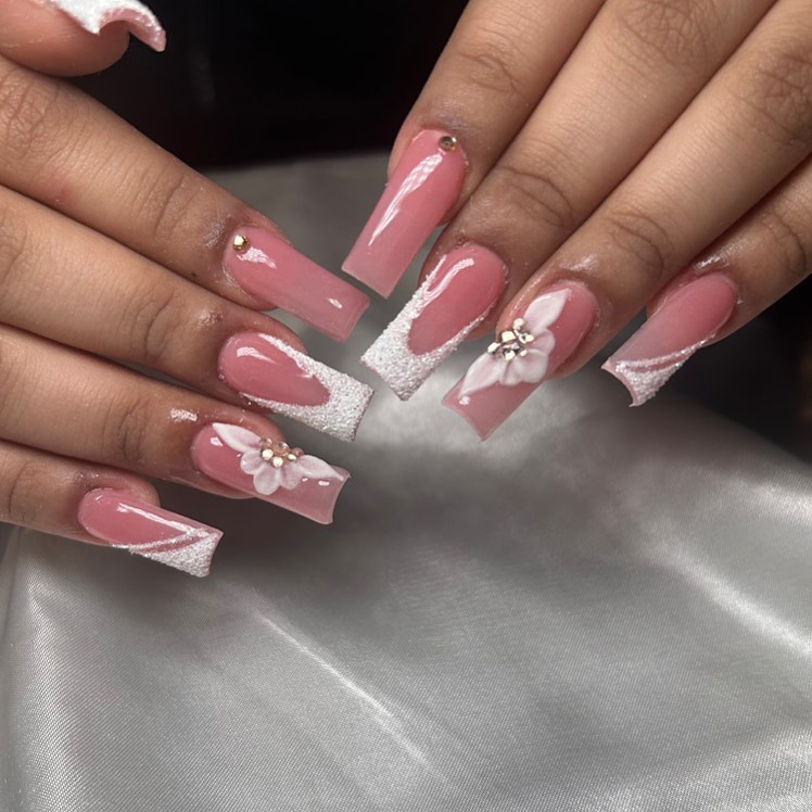 Pink and white nails with 3D petals