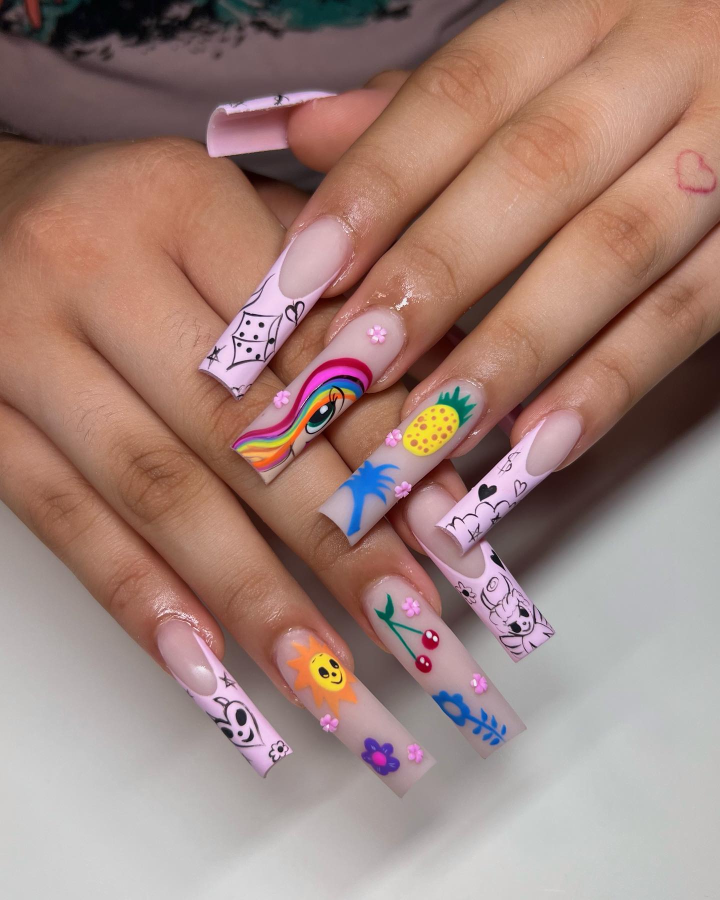 Purple Whimsical Nails With Hand-Drawn Art
