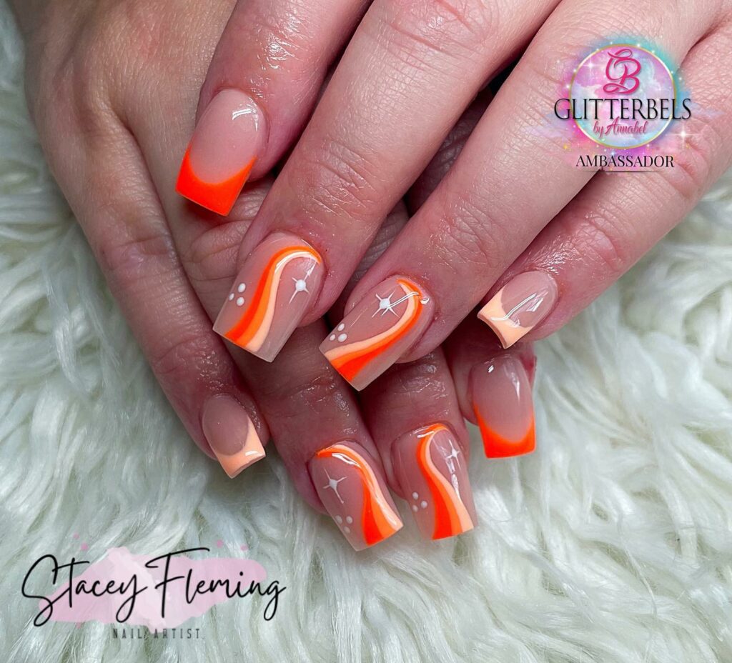 Short Acrylic Nails With Orange Swirls