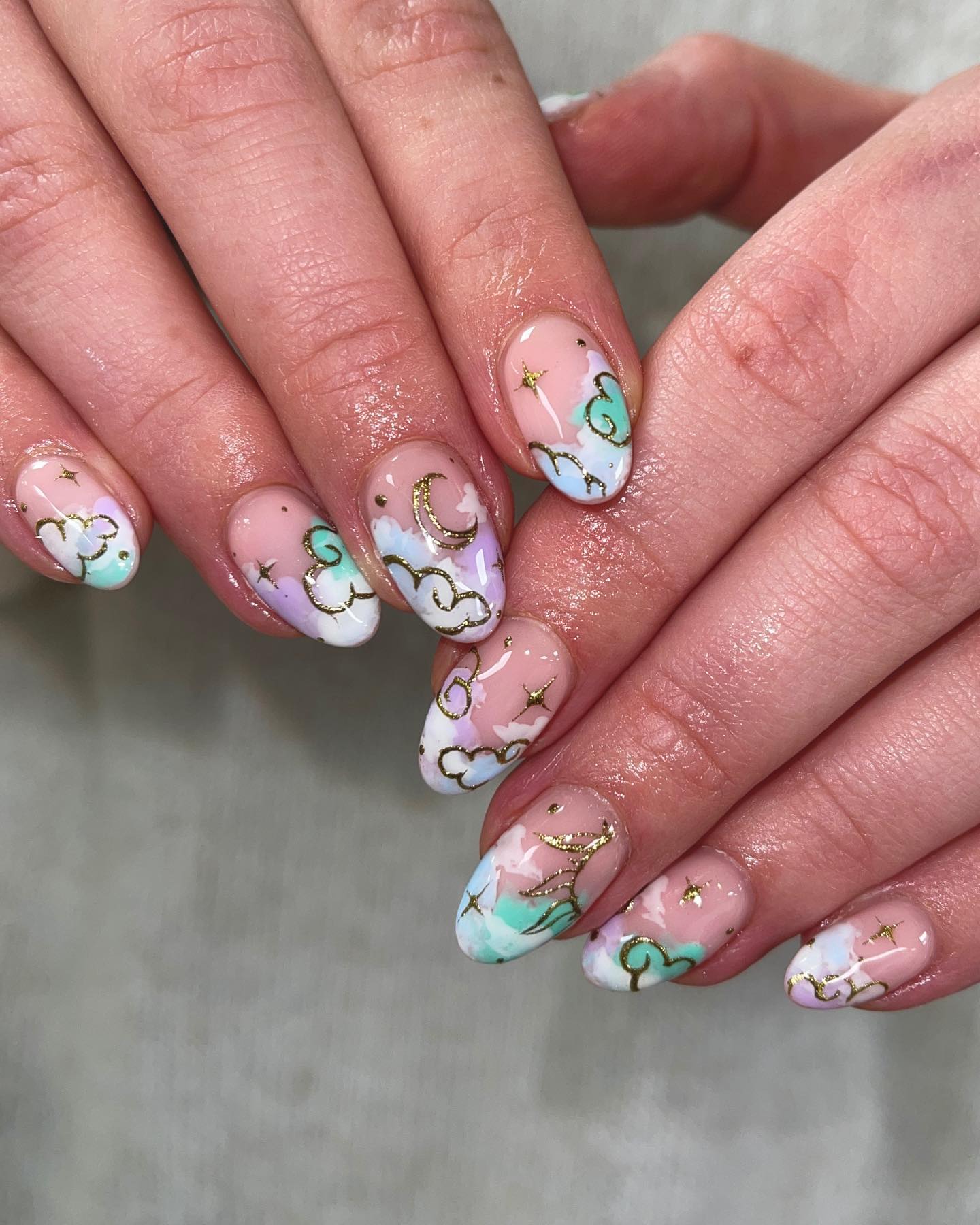 Pastel Cloud Nails With Gold Chrome