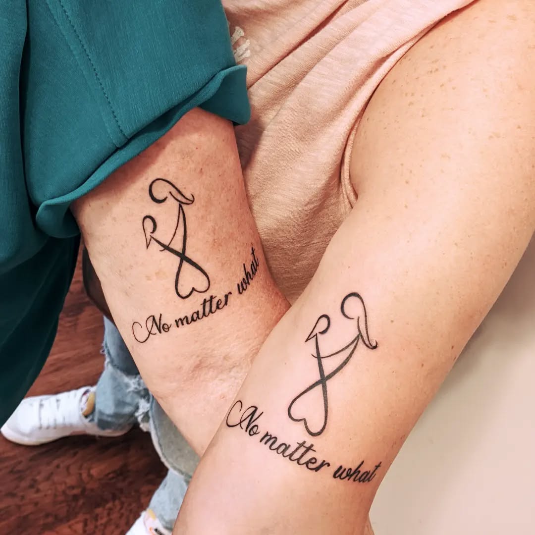 Interlocked Cursive Tattoo