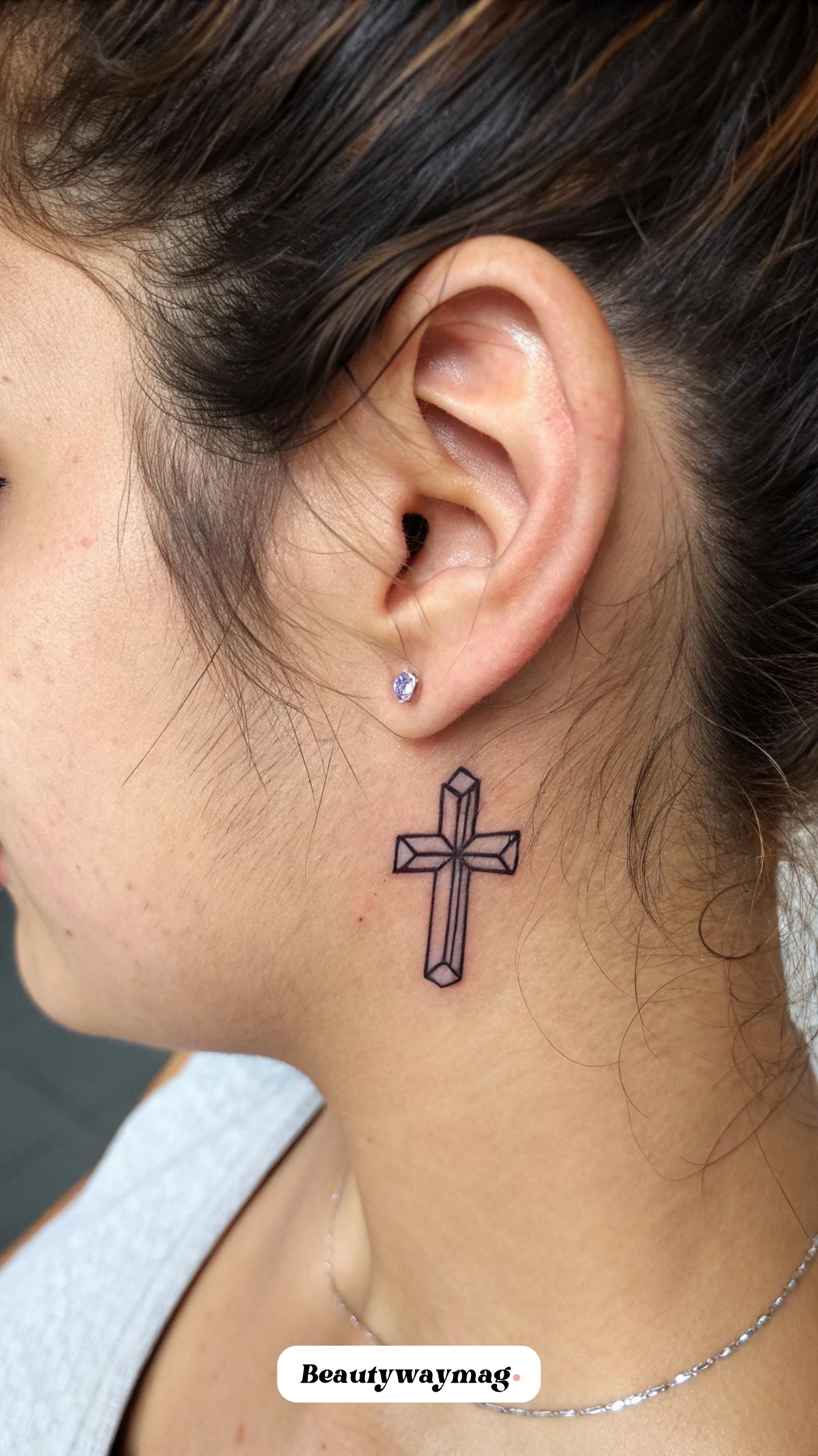 Tiny Cross Behind the Ear