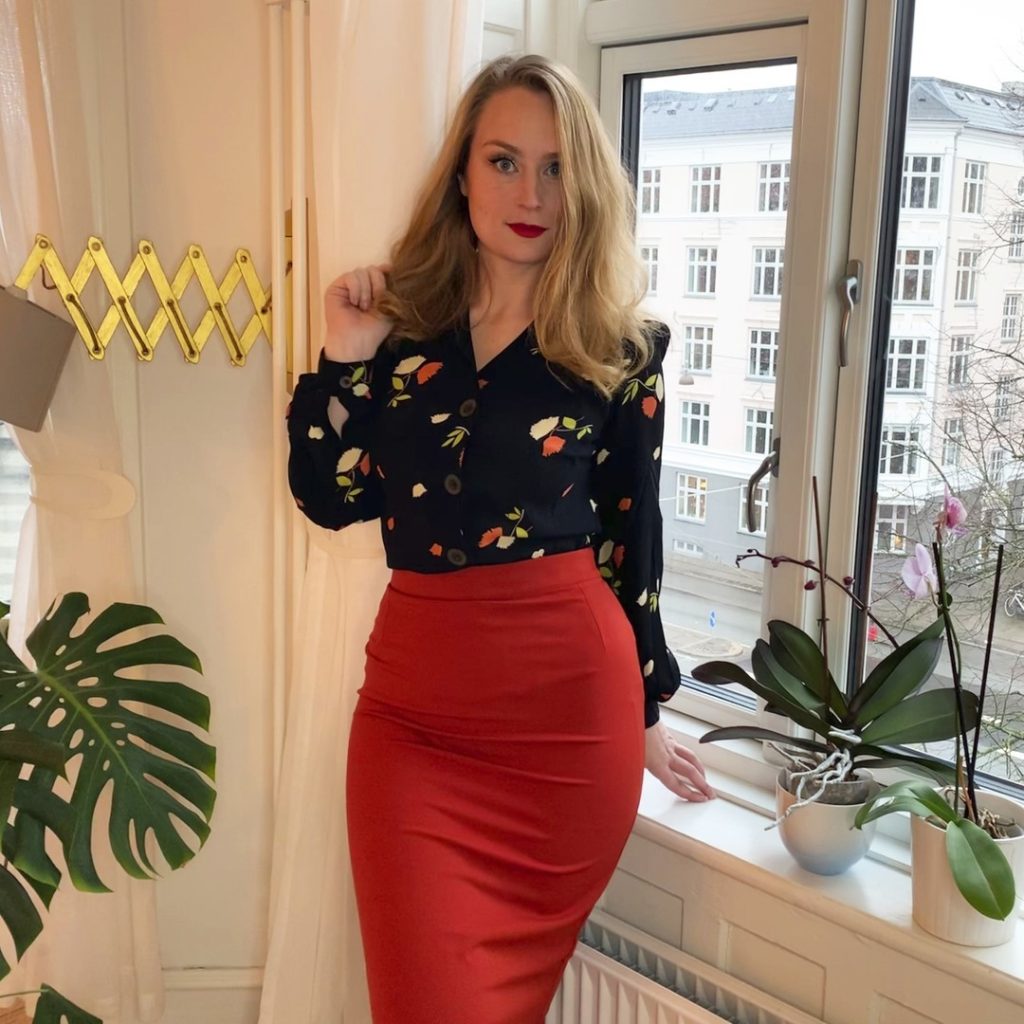 Feminine Blouse with an Orange Skirt